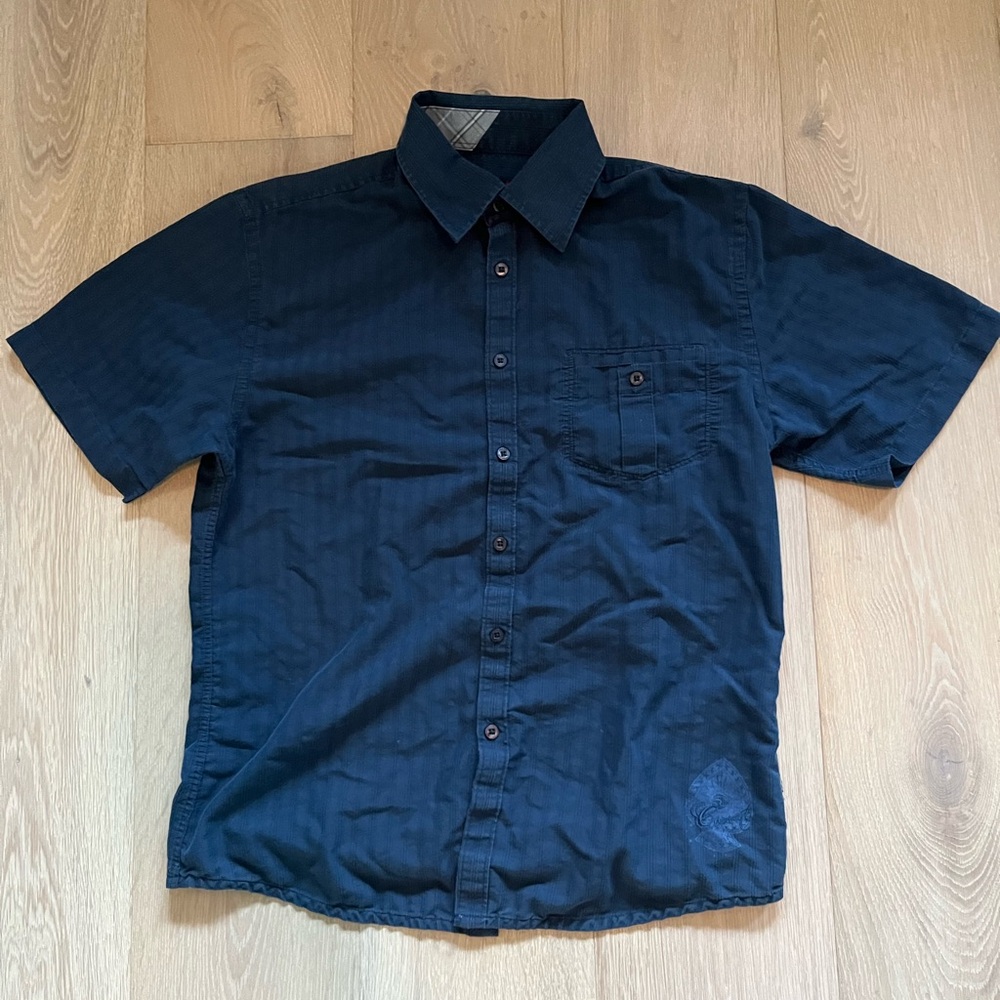Striped Dark blue Ocean current button down with “Current” embroiderey
